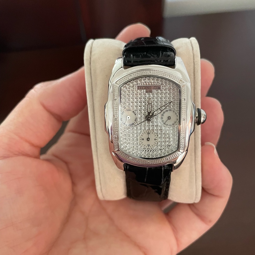 Woman’s Techno Com by KC watch: silver with black leather band